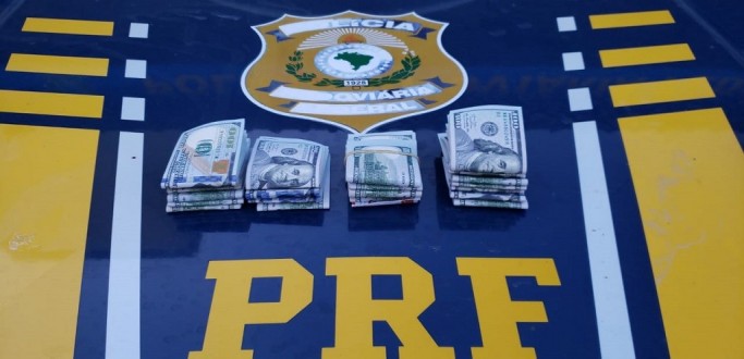 PRF LOCALIZA 25 MIL DLARES ESCONDIDOS COM PASSAGEIRO DE NIBUS, NA BR 116